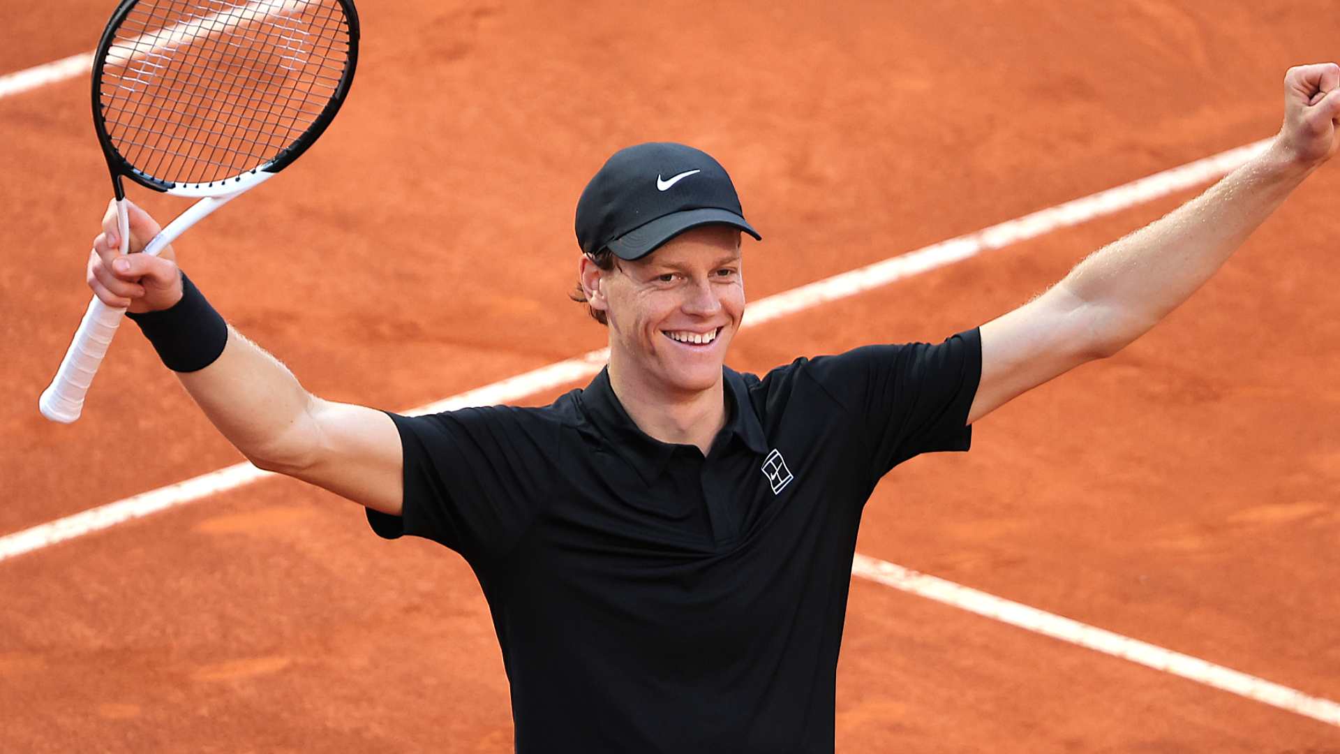 Jannik Sinner celebrates after winning the Rome crown.