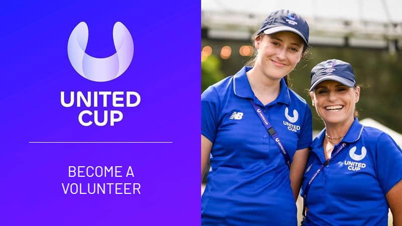 Two volunteers smiling promoting volunteer opportunities at the United Cup