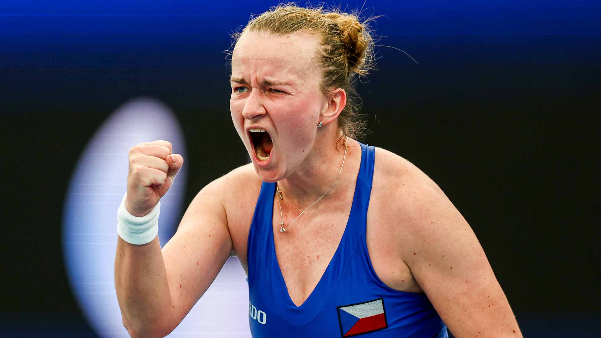 Barbora Krejcikova defeats Malene Helgo 6-4, 6-3 on Monday at the United Cup.